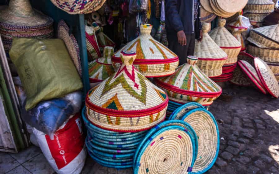 Addis Ababa: Entoto hill and Mercato Market layover tour - Traditional clothing, jewelry, and baskets