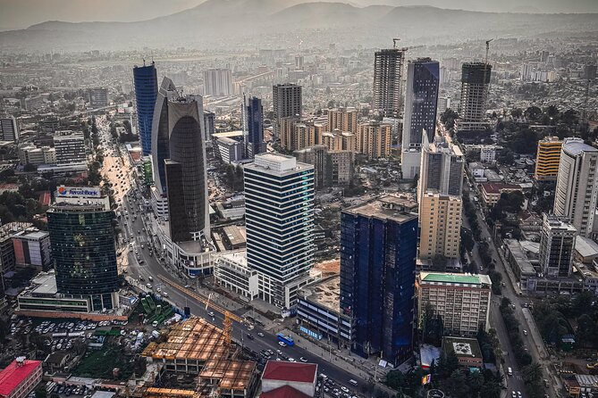 Experience a Cultural and Historical Journey through Addis Ababa - Mercato, where the city turns commercial